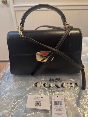 Coach Black Leather Satchel with Gold-Tone Hardware